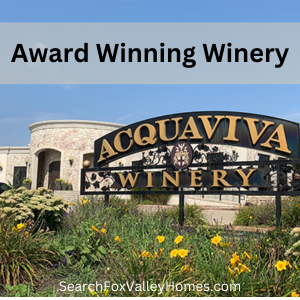 Decorative signage welcomes visitors to this Elburn area Vineyard