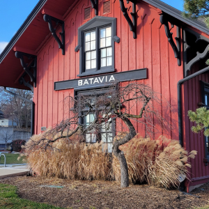 Over 150 years old, the red and black Depot Museum sits on the shore of the Fox River in Batavia