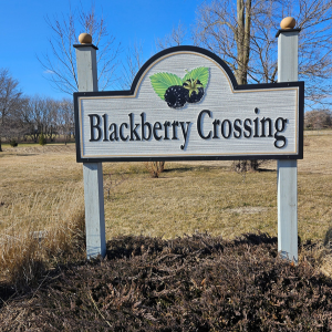 Custom sign notes the arrival in Elburn at Blackberry Creek