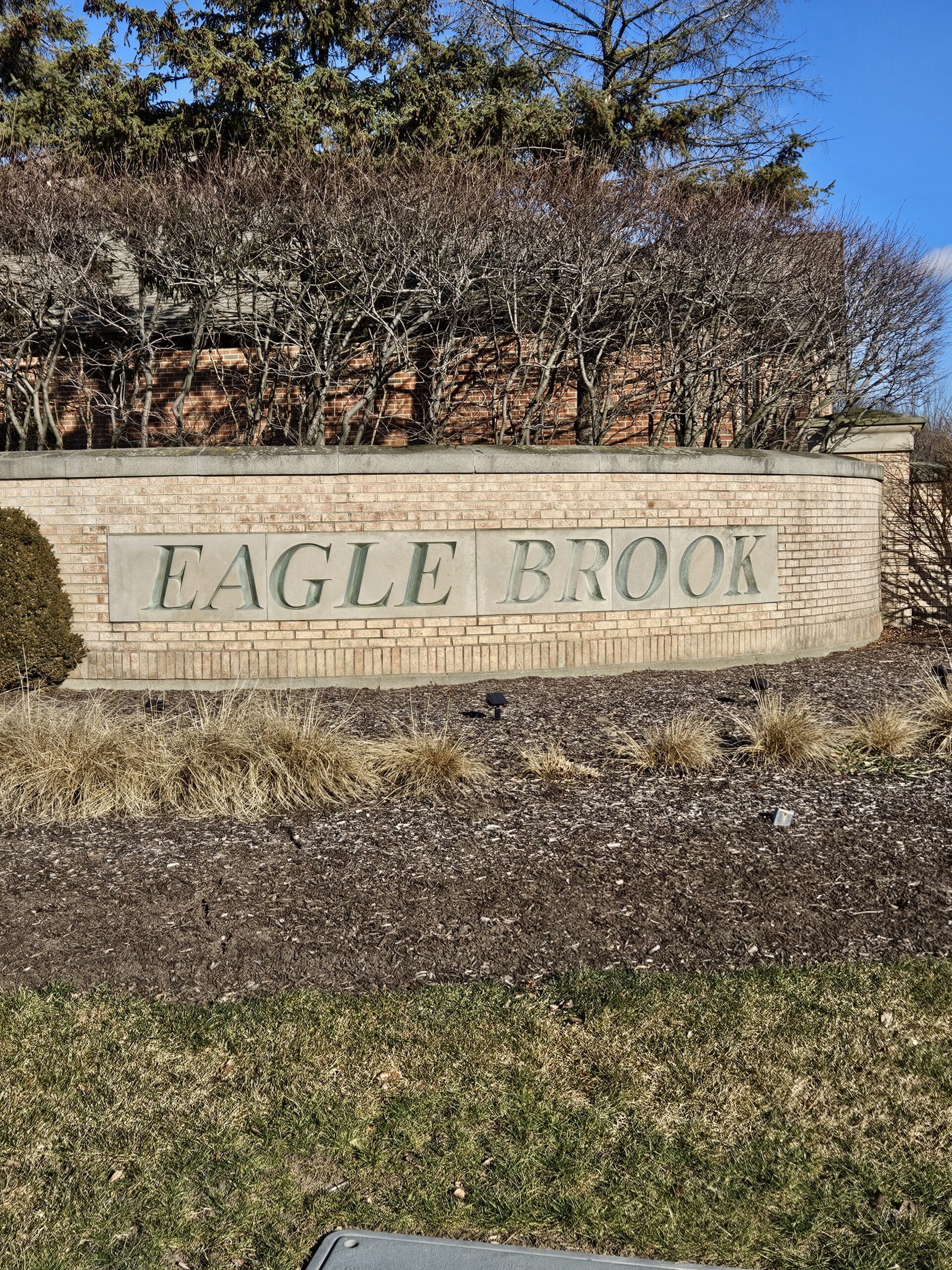 The dramatic Eagle Brook subdivision name is carved in stone in Geneva Illinois