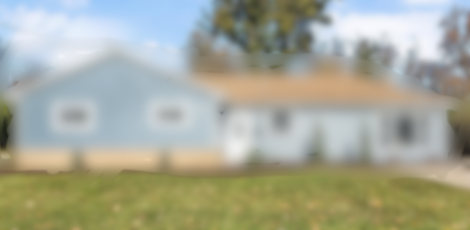 Blurred Photo of a Rehabbed Home that was Sold